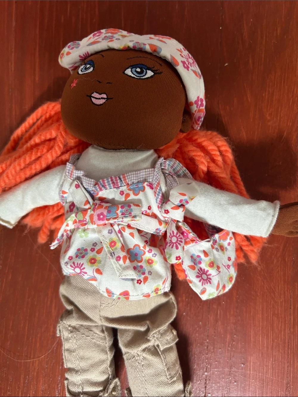 The Children's Place Brown Girl Rag Doll with Orange Yarn Hair and Floral Outfit